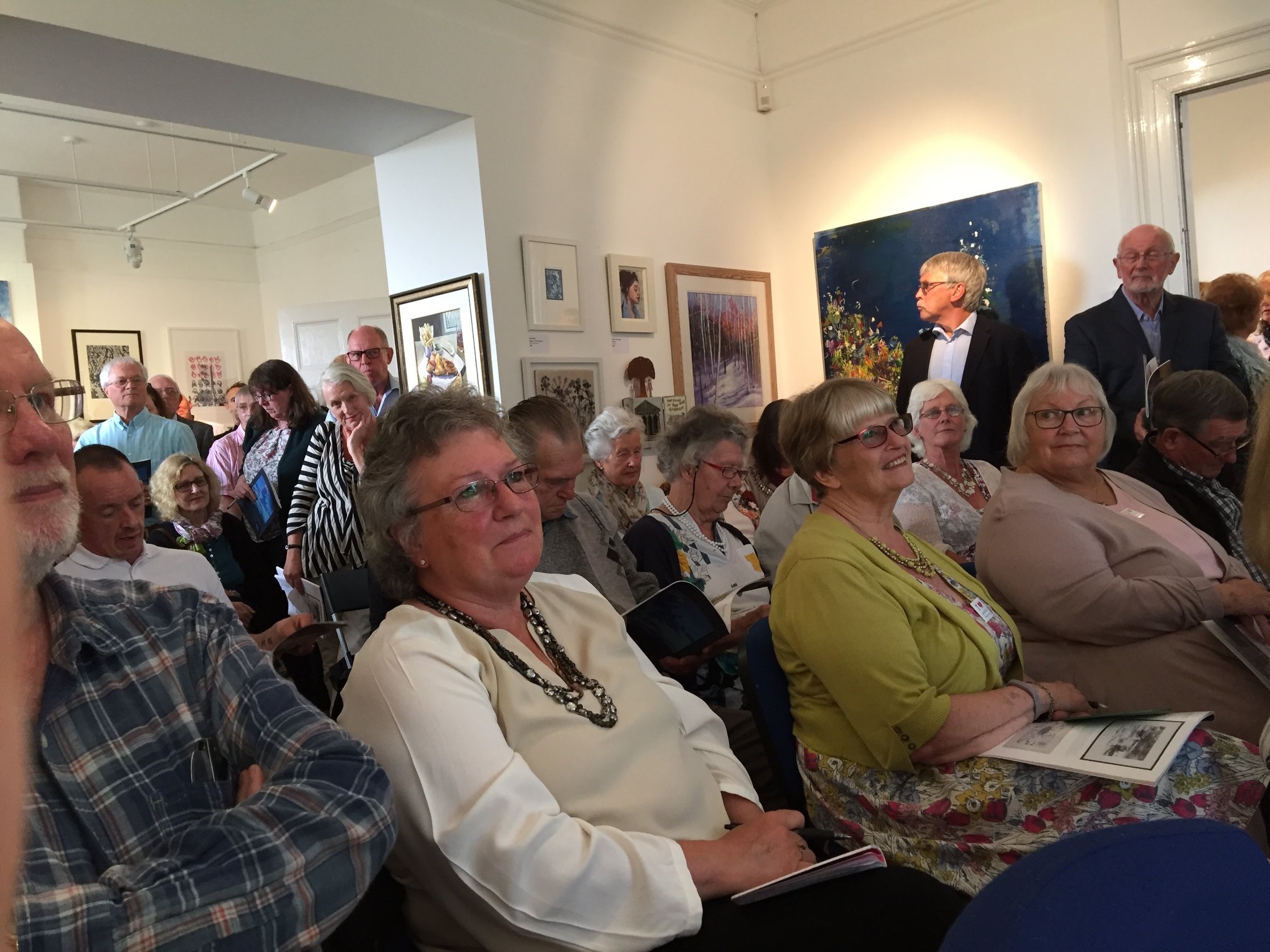 Auction room of bidders