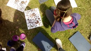 Students painting with pigments