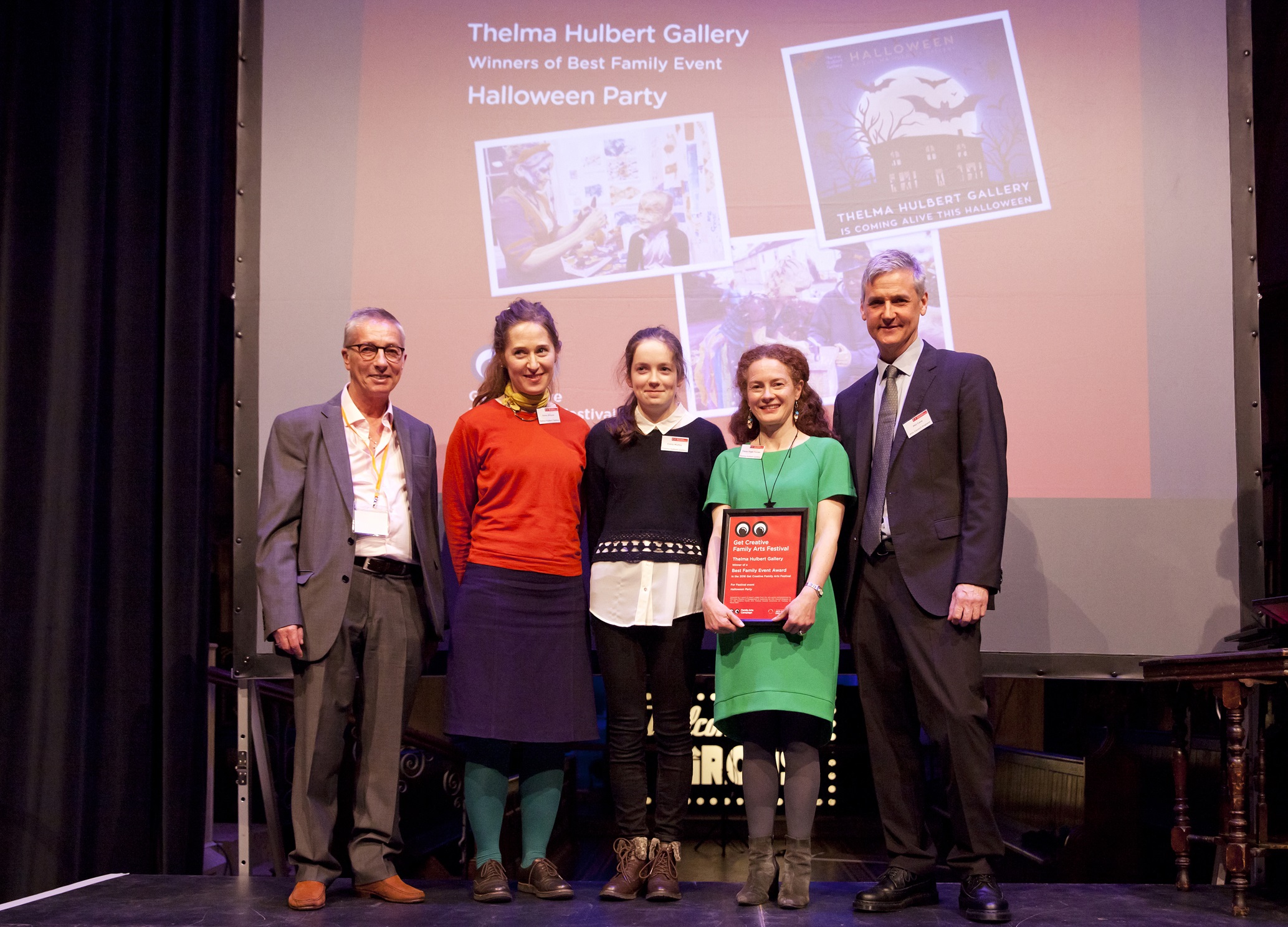 THG Team on stage receiving their award